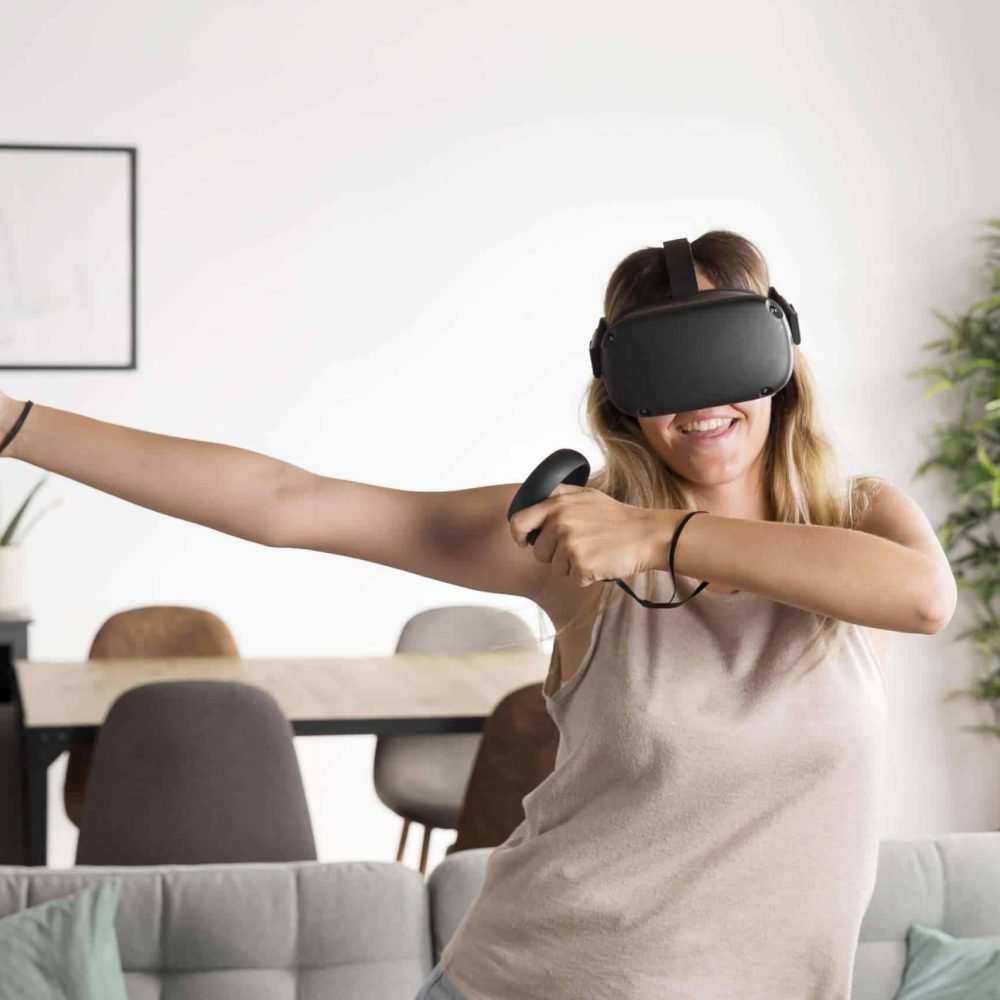 medium shot woman with controllers